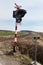 Railway crossing in the Czech Republic. Road crossing over the tracks. The inscription