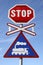 Railway crossing stop sign