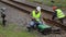 Railway employees performing maintenance on the railway