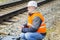 Railway Engineer working with tablet PC near railway