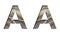 Railway font. The letter A is cut out of white paper against the background of railroad rails, mirror background for convenience.