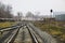 Railway in the industrial zone.empty rails with a semaphore, in