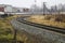 Railway in the industrial zone.empty rails with a semaphore, in