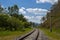 Railway leaving into the distance. Summer sunny day