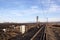 Railway Lines Running Between Burnt Farm Fields