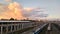 Railway platform in the suburbs of Moscow. Various types of railway communication. Urban landscape with high-rise buildings.