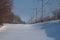 Railway power lines supports and wires, winter