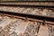 Railway rails close view - abstract background, freight transportation concept