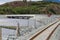 Railway and road over new river crossing, Pont Briwet bridge.