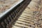 railway, sleepers and rails close-up with a perspective into the distance