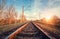 Railway station against beautiful sky at sunset. Industrial landscape