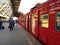 Railway Station. A train with the doors open. Beginning of boarding on the electric train.