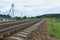 Railway stones at railroad track. Landscape with sky. Outskirts of Vitebsk, Belarus