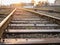 Railway at sunset. Railway station against at sunset. Industrial landscape with a railway. Railway junction. Heavy industry.