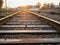 Railway at sunset. Railway station against at sunset. Industrial landscape with a railway. Railway junction. Heavy industry.