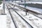 Railway switches covered in snow on a cold winter morning