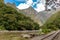 Railway to Machu Pichhu inca citadel and peruvian mountains at sunny day