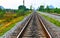 Railway Track Going Through A Beautiful Scenery.