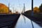 Railway track. Rail close up. Reflection on the railway track.