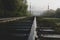 Railway tracks going into the fog