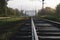 Railway tracks going into the fog