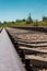 Railway tracks and gravel leading into the infinite distance