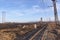 Railway Tracks Running Through Dry Wintery Countryside