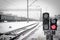 Railway traffic light with a prohibition sign, standing at the railway line transfer at the station.