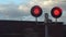 The railway traffic light is red. Stop signal for a stop at a railway crossing. the movement of the train at high speed on the rai