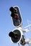 Railway traffic lights on blue sky