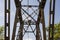 Railway viaduct against the sky and clouds in an unusual wide angle perspective. Day