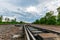 Railways. Nature landscape. Blue clouds.