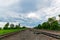 Railways. Nature landscape. Blue clouds.