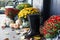 Rain Boots on Front Porch Decorated for Autumn