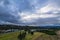 Rain clouds and aerial reverse sunset seascape at Corrigans Beach