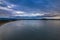 Rain clouds and aerial reverse sunset seascape at Corrigans Beach