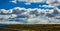 Rain clouds during the day over the plains in Utah, US