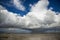 Rain Cumulus cloud over a shallow bottom of the ocean