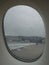 Rain Drops on an Airplane Window on a Stormy Day