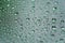 Rain drops on car glass with hydrophobic coating macro photo