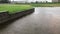 Rain drops hitting flooded loading dock driveway are West Tn