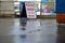 Rain falls into puddles on seaside pier in Bournemouth England.