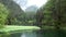 Rain on Fernsteinsee green mountain lake at Fernpass in Nassereith Austria.