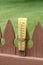 Rain gauge on a picket fence