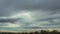 Rain and gray clouds. Puffy fluffy dark clouds. Cumulus cloud sky cloudscape time lapse. Autumn time lapse. Nature