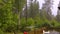 Rain with hail on wooden patio on summer day.