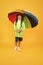 Rain is not so bad if you have water resistant clothes. Carefree schoolgirl colorful umbrella wear waterproof rain coat