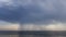 Rain over river. Beautiful thunder clouds over the river, shooting from a car that goes on the road along the water.