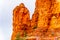 Rain pouring down on the geological formations of the red sandstone buttes surrounding the Chapel of the Holy Cross at Sedona