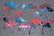 Rain. Raindrops fall down against the gray background with blue, red and pink umbrella silhouettes.